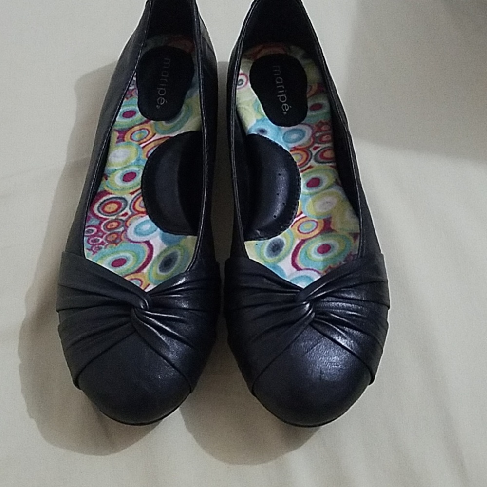 Black leather flats